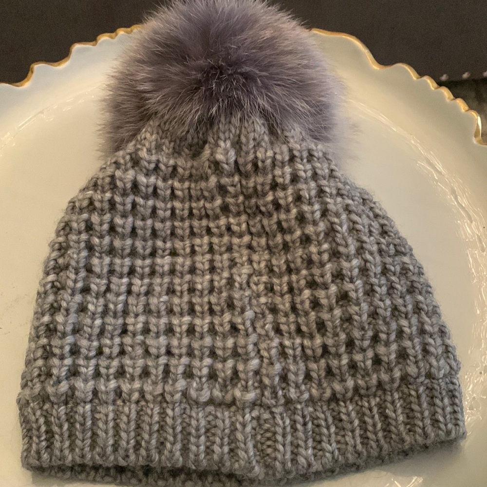 Flawless Faux in our Classic Kyi Kyi Beanie. It looks almost too good